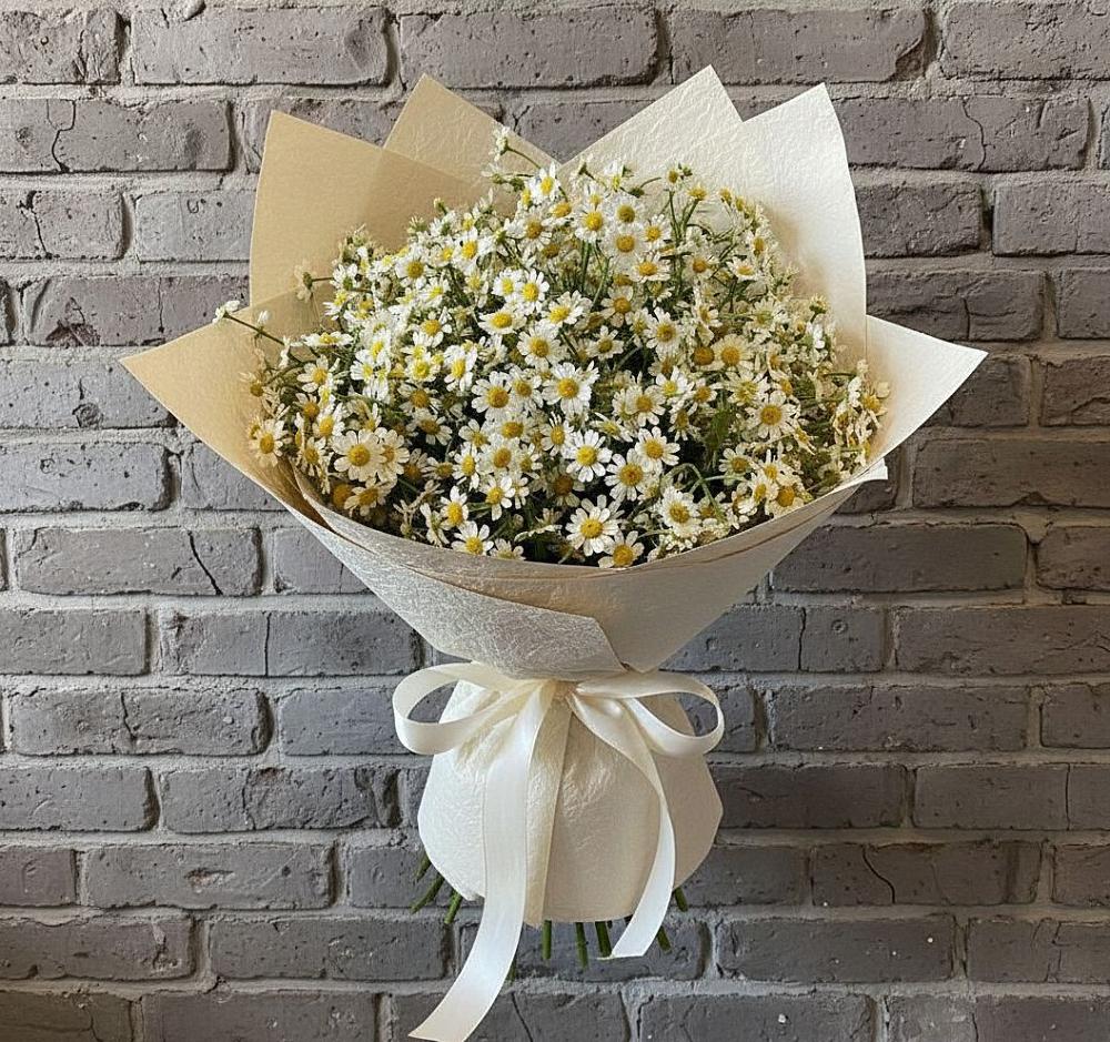 Букет цветов из: Ромашки в Пурпе
